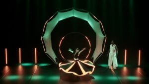 Whirling dervish dancer with a programmable LED skirt creating light patterns.