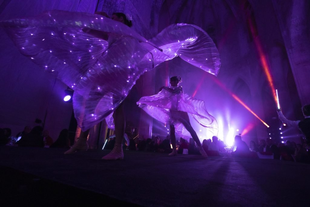 LED wing performers in Paris France by the Company Fusion Arts