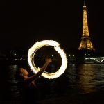 fire dancer in Paris France in a fire juggling act by the Company Fusion Arts
