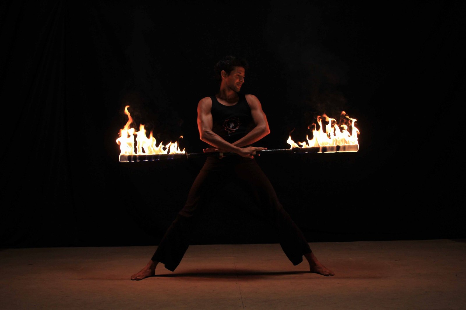 Ex Cirque du Soleil Fire Dancer Srikanta Barefoot performing with the fire staff