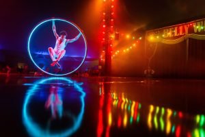 LED Cyr wheel performance in Monaco by ex Cirque du Soleil Cyr wheel performer Srikanta Barefoot